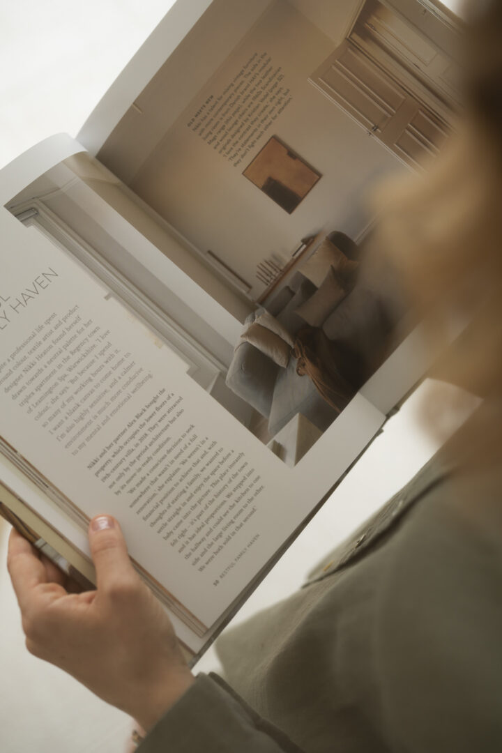 Tiare Brasseur interior design book hands top view